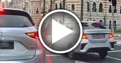 红灯还加速硬闯 恶司机险撞飞女行人