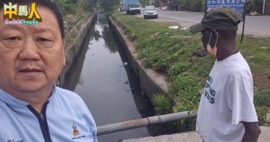 班村巴板路沟塞阻排水 市厅派员清理 不再淹