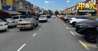 刘佩明：泊车收费规定应统一